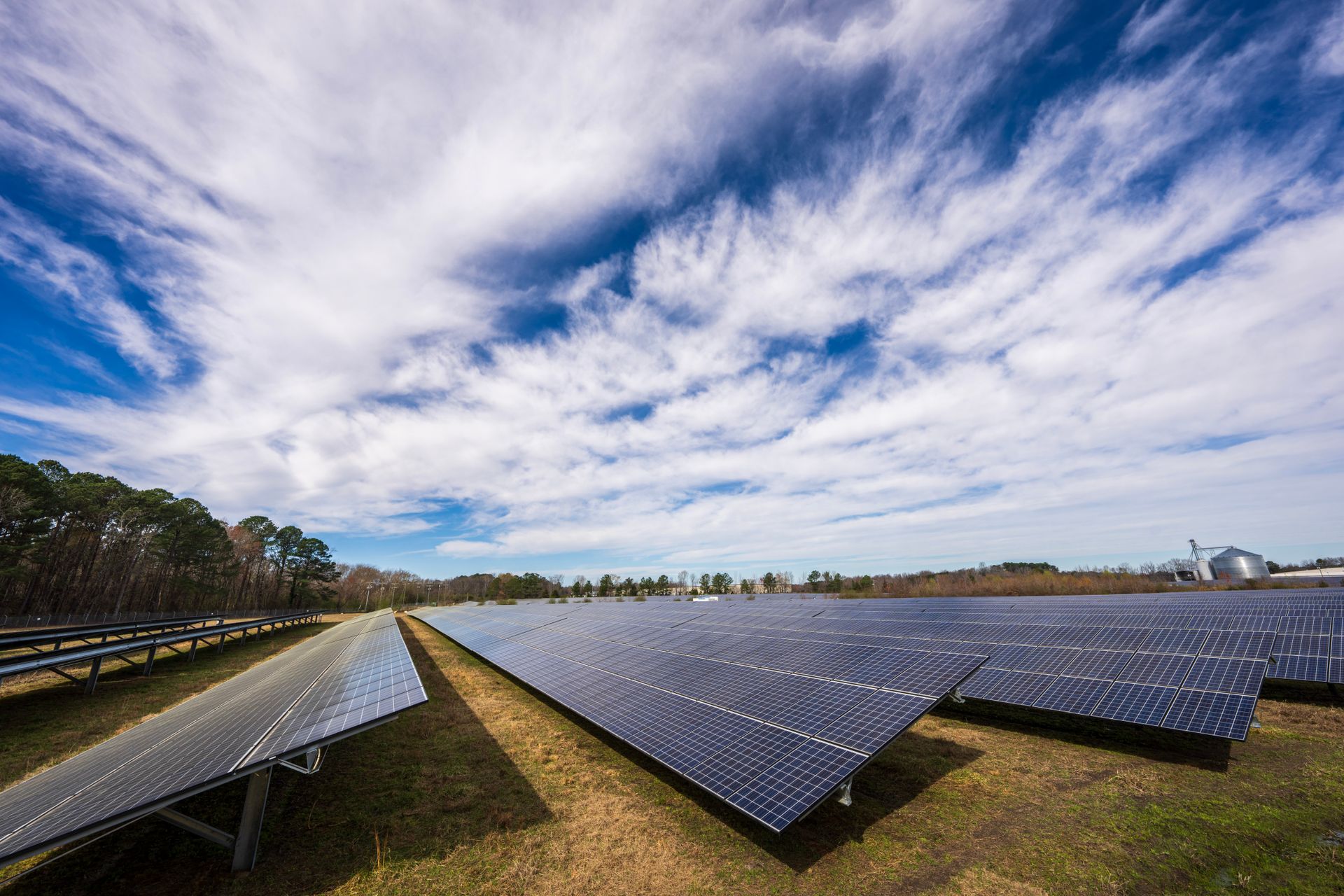Rows of photovoltaic panels at a solar installation